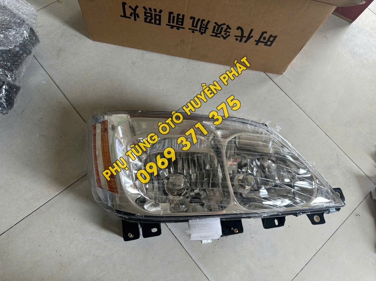 Đèn pha xe Thaco Trường Hải dài 65